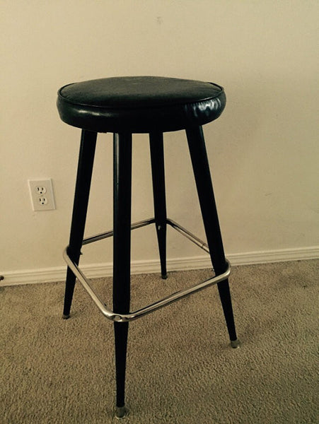 Vintage Mid Century Black Metal Barstool with Vinyl upholstery and Chrome footrest