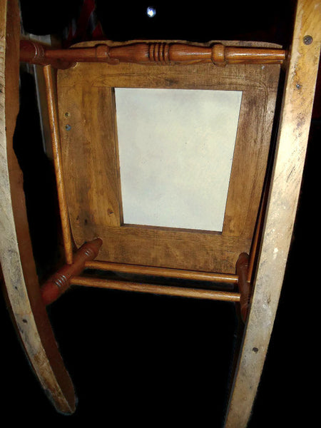 Early twentieth century press back oak wood rocking chair